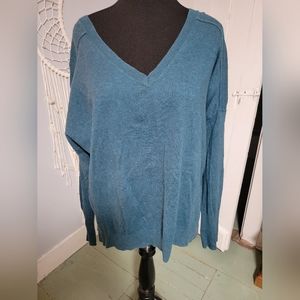 Woman's GAP turquise blue front and back V neck sweater.